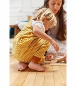 DockATot Sleep Romper, 18-36 Months, TOG 1.0 - Golden Stripe -Little Unicorn Store dockatot sleep romper 18 36 months tog 1 0 golden stripe 128