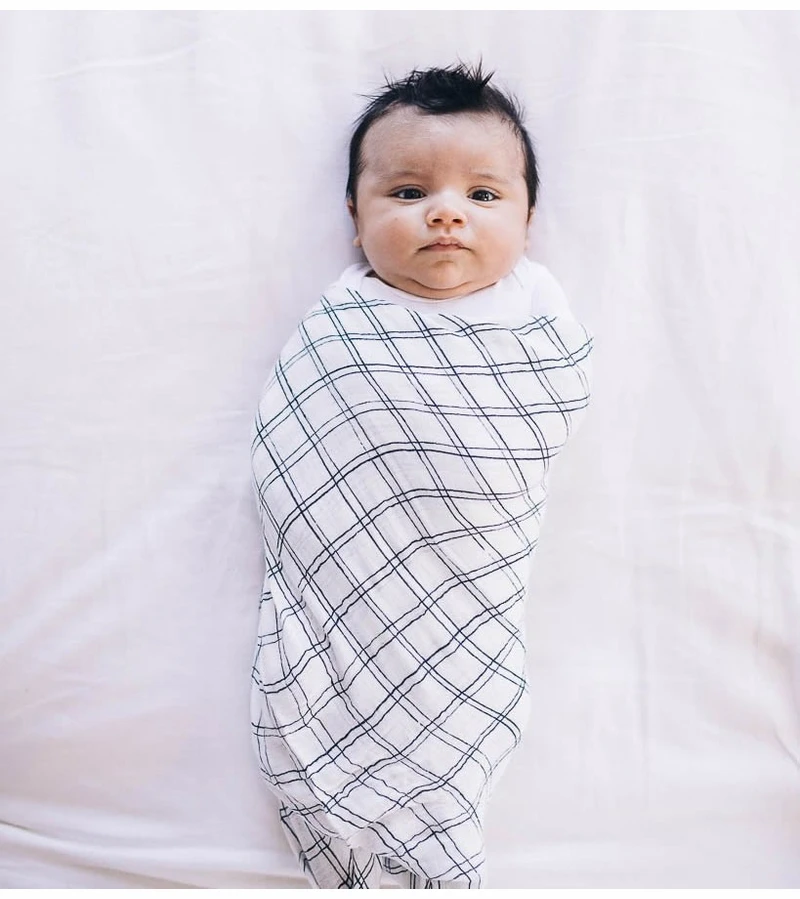 Little Unicorn Deluxe Muslin Swaddle 2 Pack White Anemone 8 Little Unicorn Deluxe Muslin Swaddle 2 Pack White Anemone - Image 6