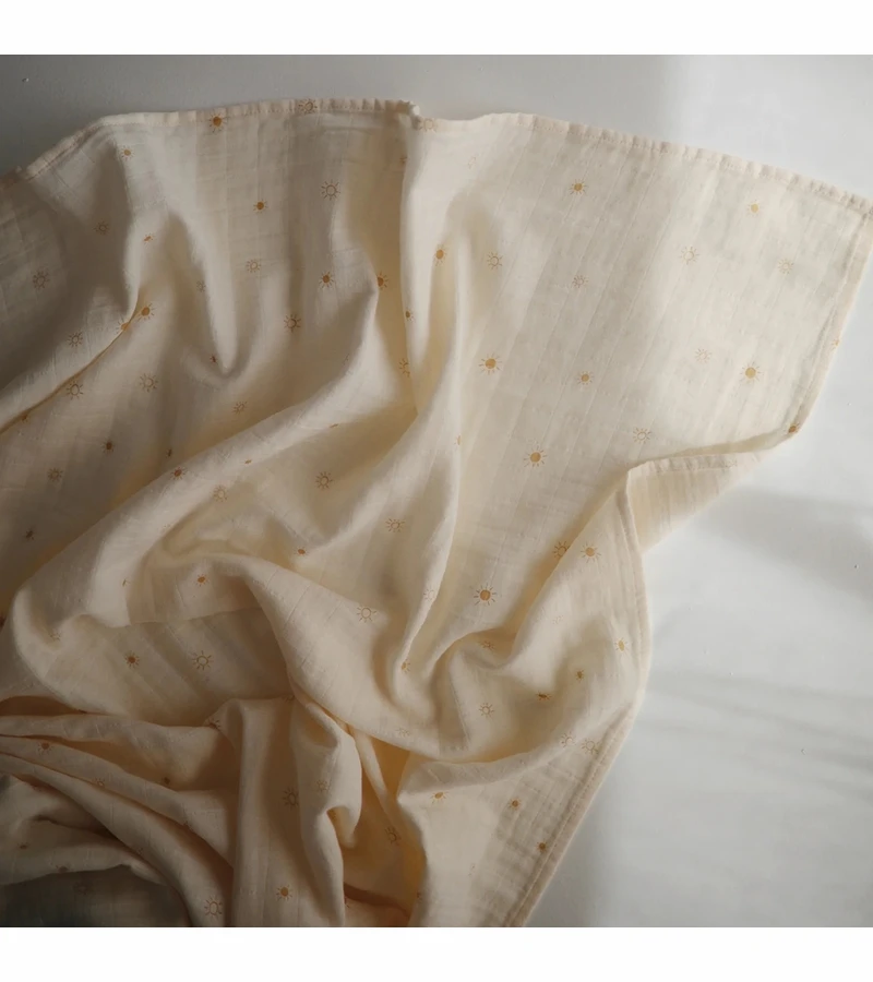 Mushie Organic Cotton Muslin Swaddle Blanket - Sun 4 Mushie Organic Cotton Muslin Swaddle Blanket - Sun - Image 2