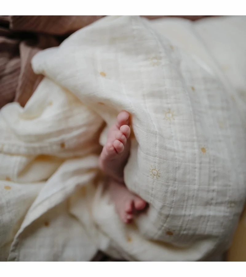Mushie Organic Cotton Muslin Swaddle Blanket - Sun 5 Mushie Organic Cotton Muslin Swaddle Blanket - Sun - Image 3